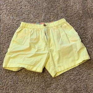 Yellow Chubbies shorts.